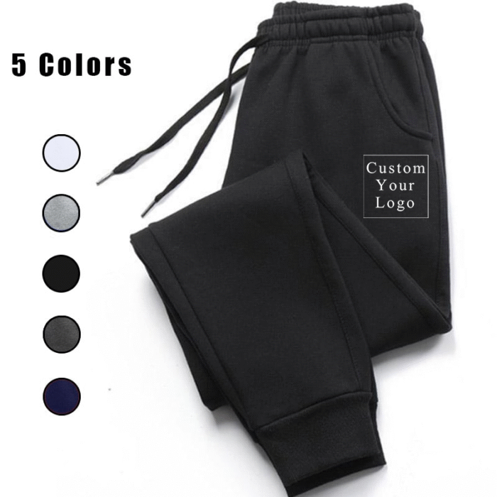 A pair of black men's jogger sweatpants with an elastic waistband, drawstring, cuffed ankles, and side pockets. The image also shows five color options (white, gray, black, dark gray, navy blue) and text "Custom Your Logo."