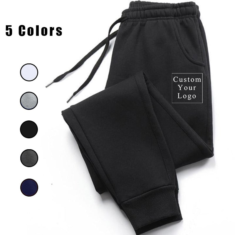 A pair of black men's jogger sweatpants with an elastic waistband, drawstring, cuffed ankles, and side pockets. The image also shows five color options (white, gray, black, dark gray, navy blue) and text "Custom Your Logo."