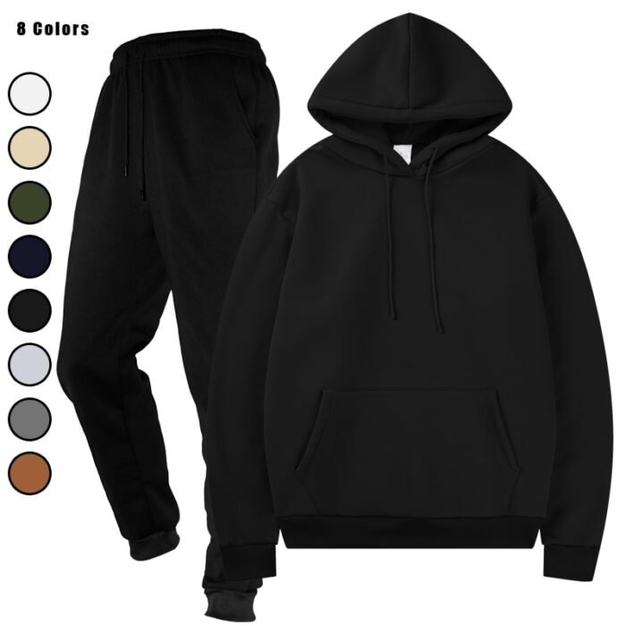 Stack of folded hooded sweatshirt and jogger sweatpants sets in multiple colors, including black, dark grey, light grey, and beige.