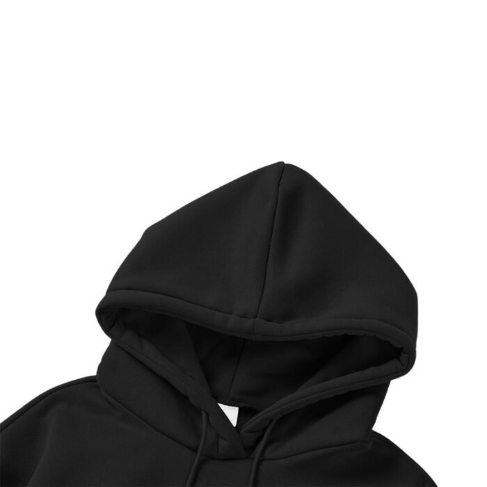 Interior view of the hood of a black hooded sweatshirt, showcasing the smooth lining.