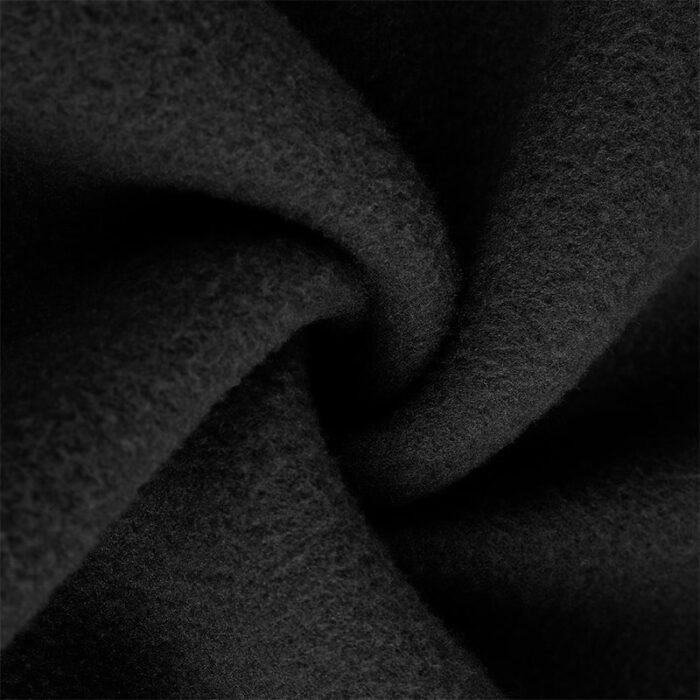 Close-up of 250G black fleece fabric with soft, thick texture and smooth outer surface, ideal for jogger pants